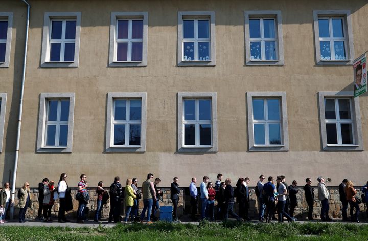 People wait in line to vote during Hungarian parliamentary elections at a polling station in Budapest, Hungary, on April 8, 2018.