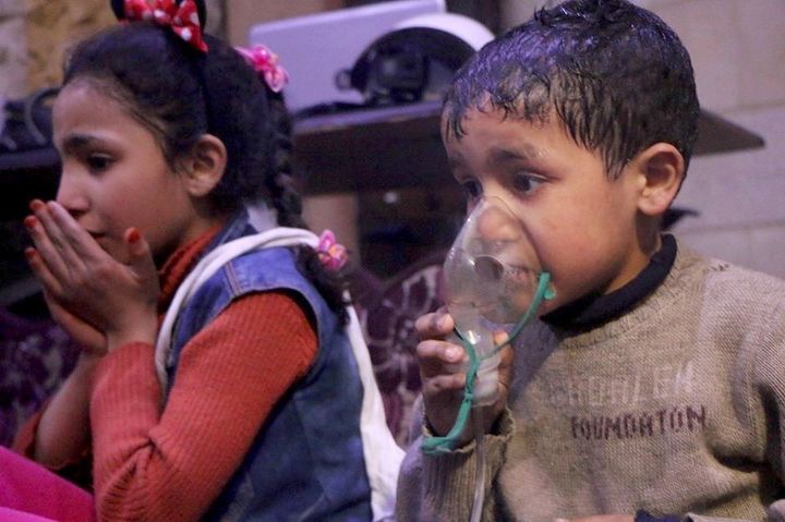 Affected Syrian children receive medical treatment after the alleged poisonous gas attack in Damascus.