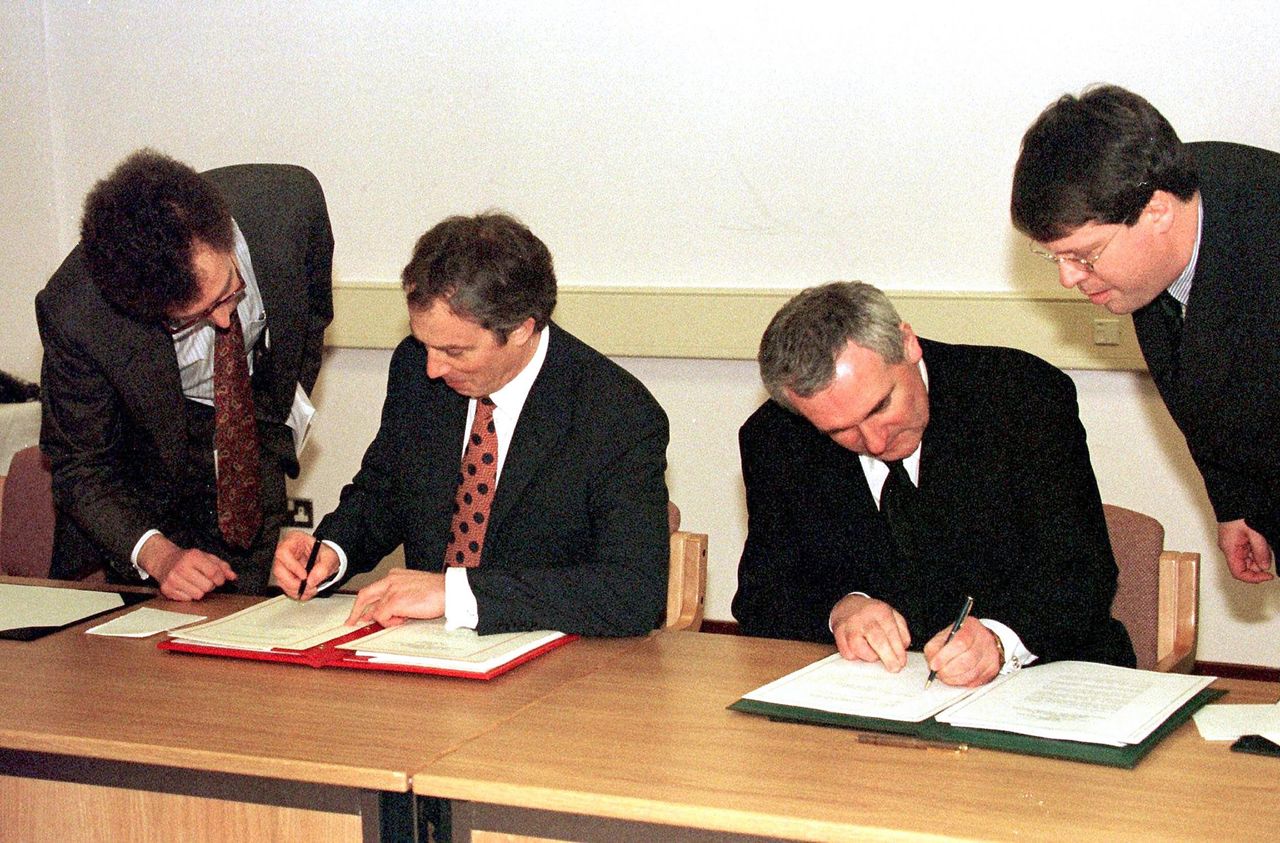 Former British Prime Minister Tony Blair (left) and Irish Taoiseach Bertie Ahern signing the Good Friday Agreement in 1998 