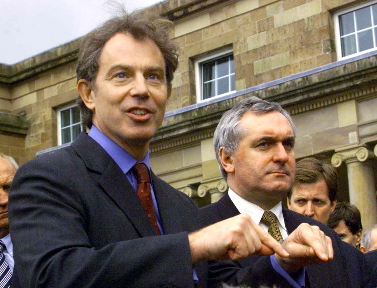 Bertie Ahern and British Prime Minister Tony Blair speak to the media during a news conference at Hillsborough Castle.