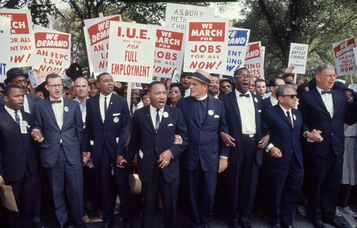 Dr. Martin Luther King Jr. and other prominent civil rights and religious leaders walk during the March on Washington for Jobs & Freedom in 1963.