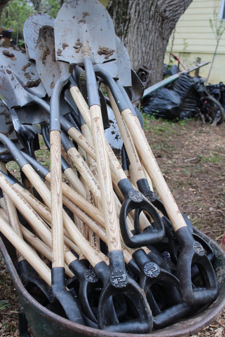 Lead to Life's shovels during a garden action day in Atlanta over the weekend. The tools feature inscriptions promoting nonviolence and handles made from an iron alloy that includes metal from melted guns.