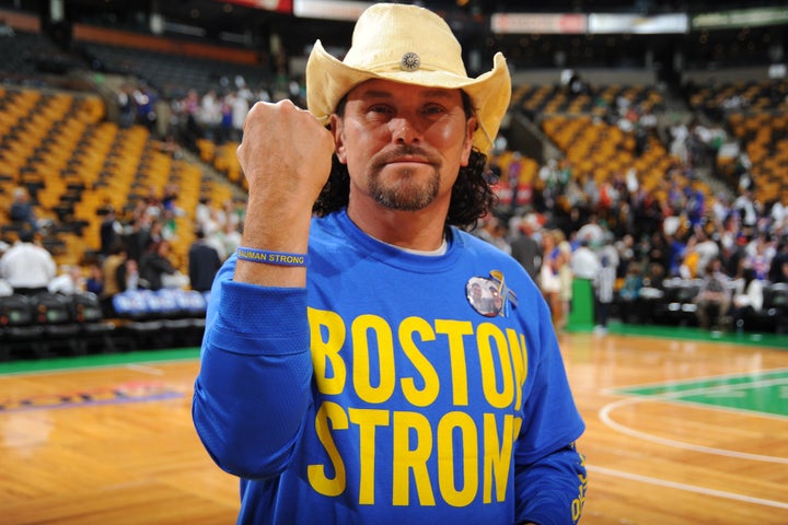 Carlos Arredondo, at a Boston Celtics game in 2013, has been training for Monday's marathon since January.