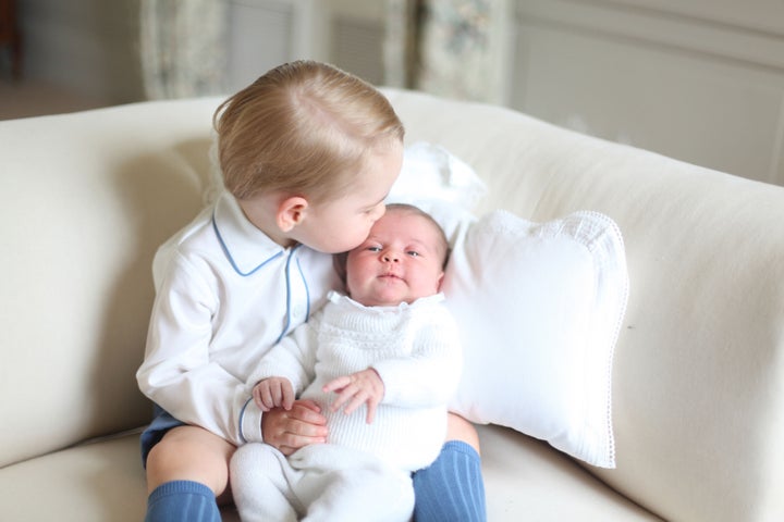 Prince George with Princess Charlotte in a photo taken by the Duchess of Cambridge in 2015.