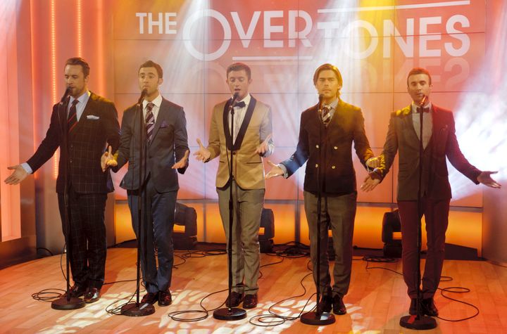 Timmy (centre) performing with The Overtones.