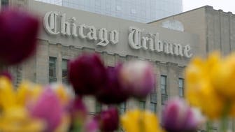 Flowers are seen outside the Chicago Tribune building in Chicago, Illinois, United States, May 11, 2016.     REUTERS/Jim Young 