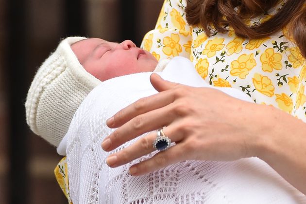 Princess Charlotte was wrapped up in a knitted bonnet and shawl when she left hospital on 2 May 2015.