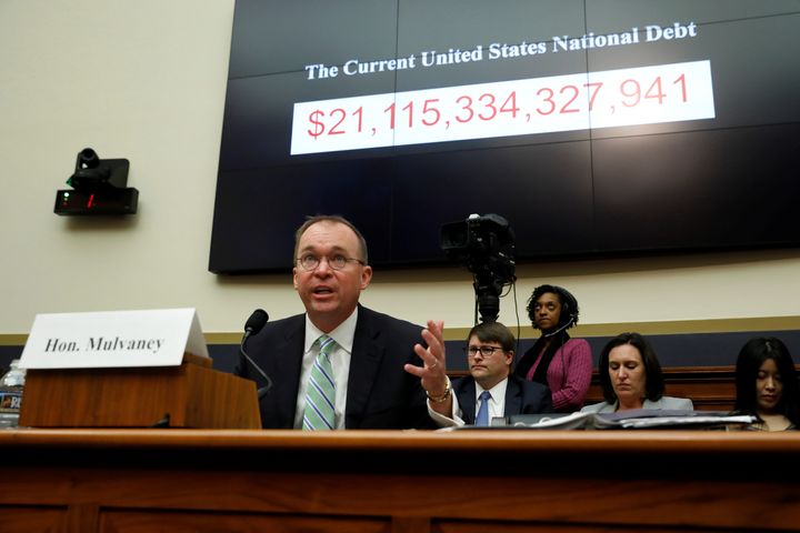 Office of Management and Budget Director Mick Mulvaney, who is also acting director of the Consumer Financial Protection Bureau, testifies at a House Financial Services Committee hearing Wednesday.