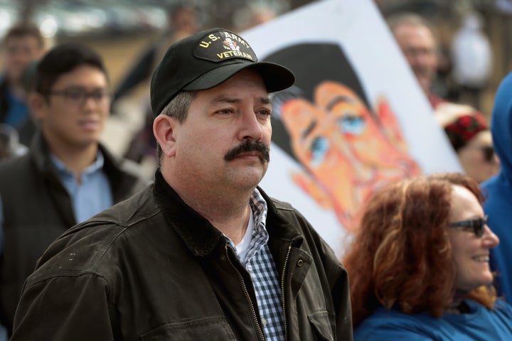 Democrat Randy "IronStache" Bryce participates in the March for Our Lives rally for greater gun regulation in Janesville, Wisconsin, on March 28, 2018.