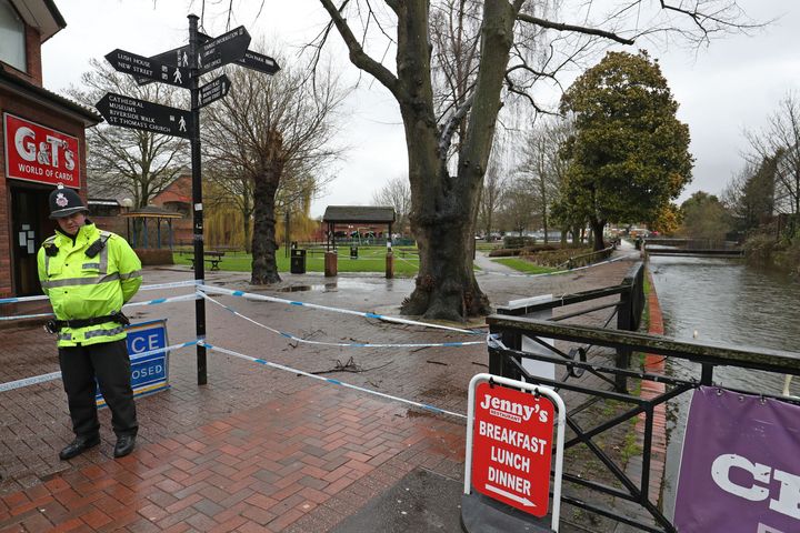 A police officer at one of the cordons set up in Salisbury after the Skripals were found there collapsed on a park bench