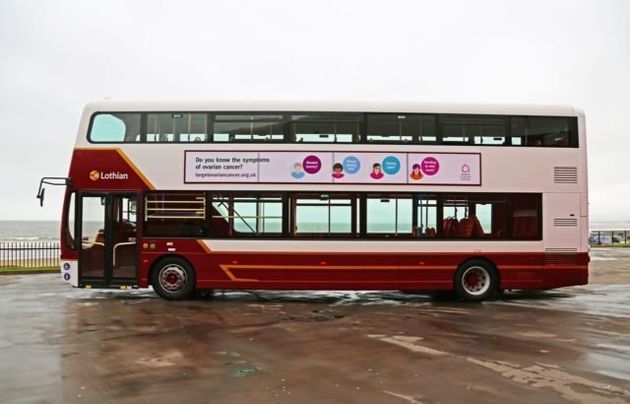 A Lothian buses vehicle with the new signage highlighting the four symptoms of ovarian cancer 