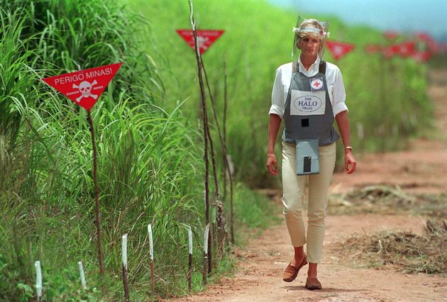 Diana, Princess Of Wales, visits a minefield being cleared by the charity Halo in Huambo, Angola, wearing protective body armour and a visor on 15 January 1997.