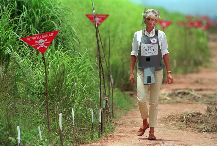 Diana, Princess Of Wales, visits a minefield being cleared by the charity Halo in Huambo, Angola, wearing protective body armour and a visor on 15 January 1997.