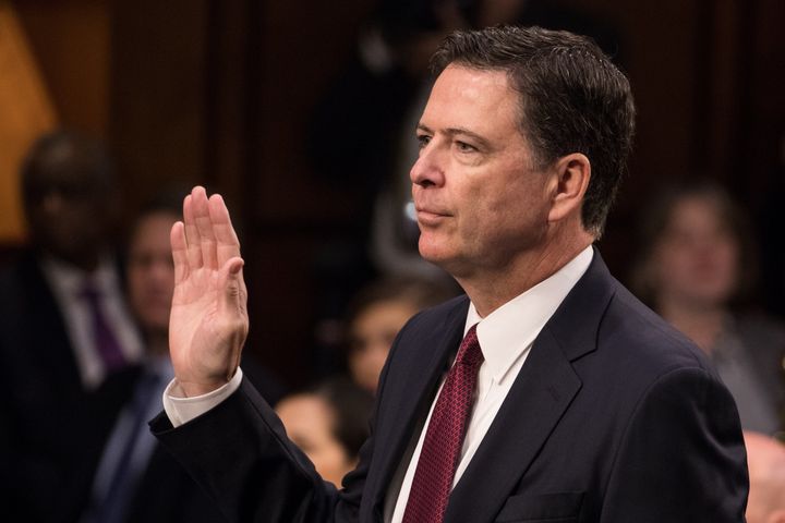 Former FBI Director James Comey is sworn in before he testified to the Senate Intelligence Committee on June 8, 2017.
