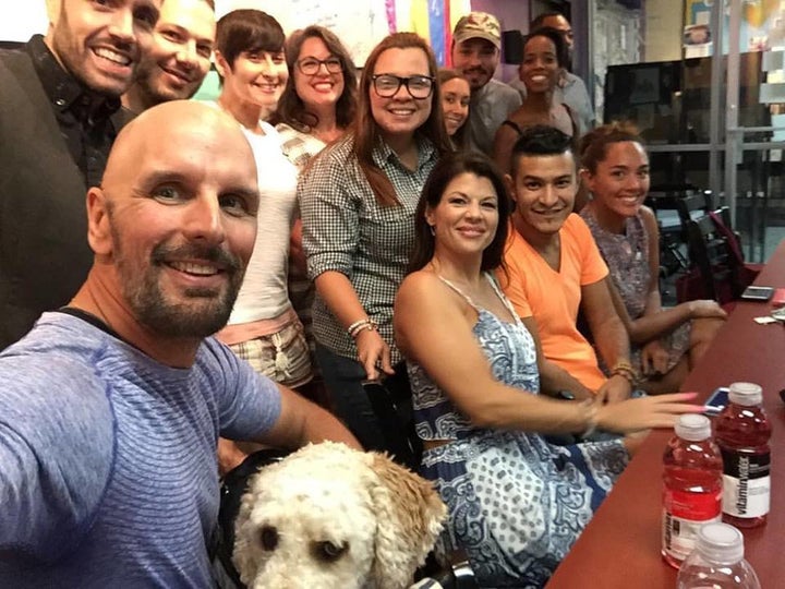 Dave Fortier (far left), who co-founded the nonprofit One World Strong, meets with survivors of the Pulse nightclub shooting 