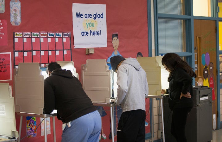 Americans cast their votes in Ferguson, Missouri, on Nov. 4, 2014.