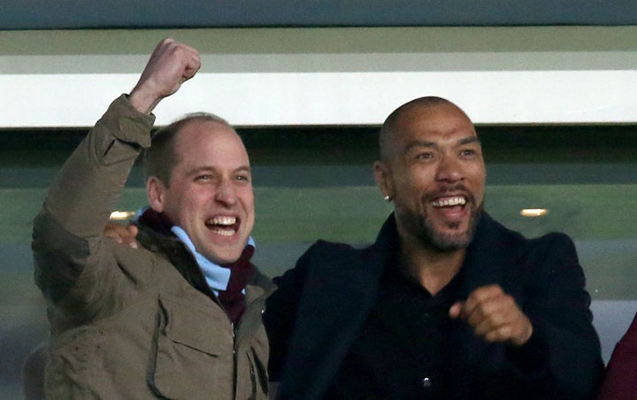 The Duke of Cambridge and former striker John Carew celebrate Jack Grealish's goal during the soccer match on Tuesday.