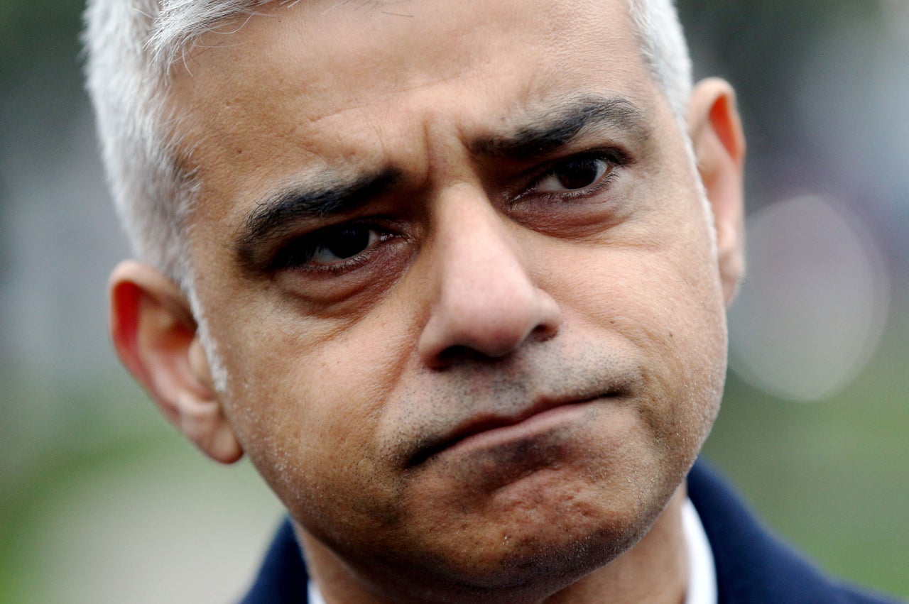 Mayor of London Sadiq Khan speaks to the press as police officers conduct a weapons sweep in Thornton Heath, south London.