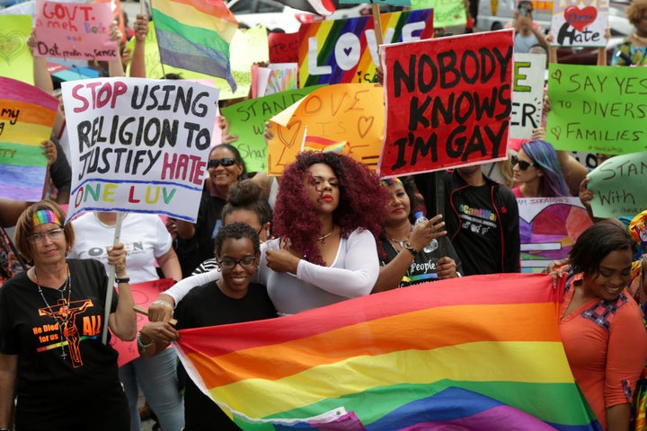 Supporters of LGBTQ rights demonstrate outside Trinidad and Tobago's Hall of Justice in Port-of-Spain.