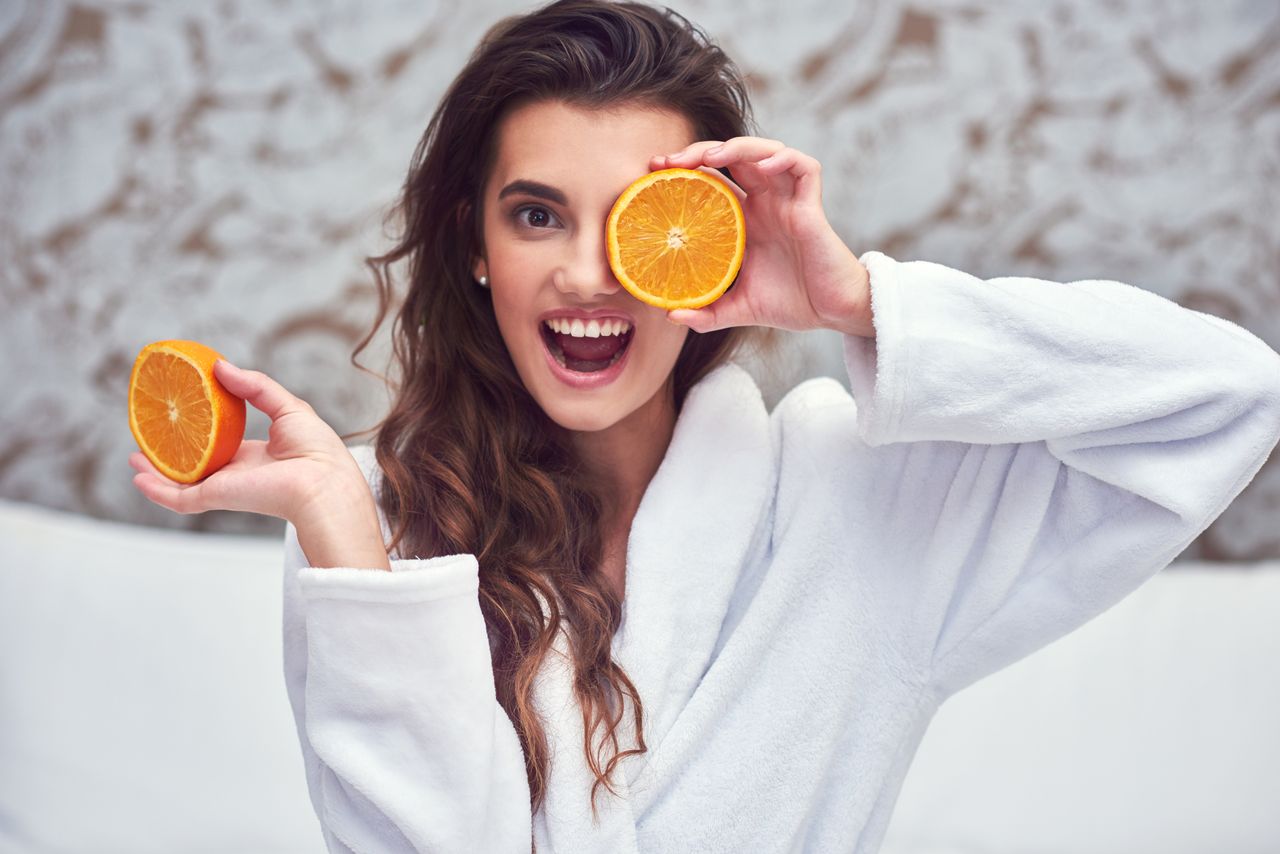 You don't need to love oranges as much as this woman to include Vitamin C in your skincare routine.