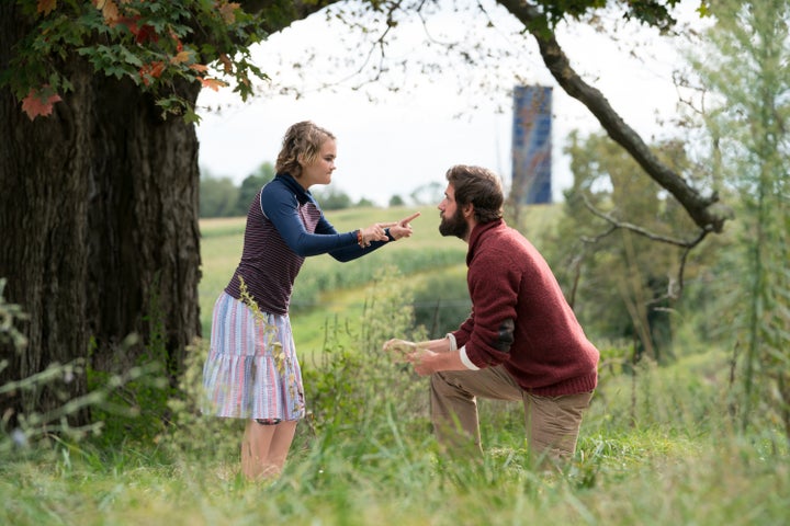 Millicent Simmonds as Regan Abbott and John Krasinski as Lee Abbott in "A Quiet Place."