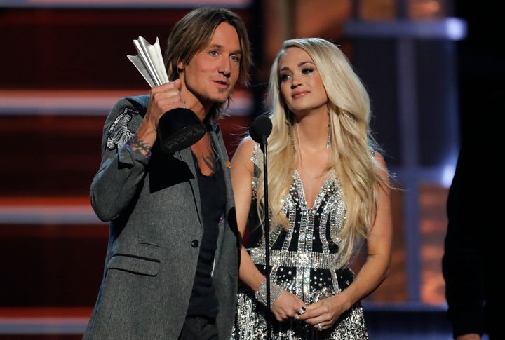 Keith Urban and Carrie Underwood won the award for Vocal Event of the Year for "The Fighter" at the 53rd Academy of Country Music Awards in Las Vegas in Sunday.