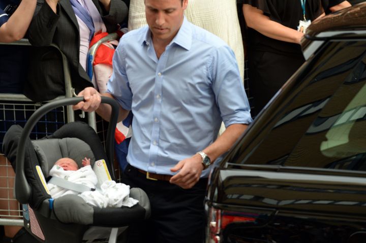 The Duke and Duchess of Cambridge leave St Mary's Hospital with their newborn son Prince George in July 2013.