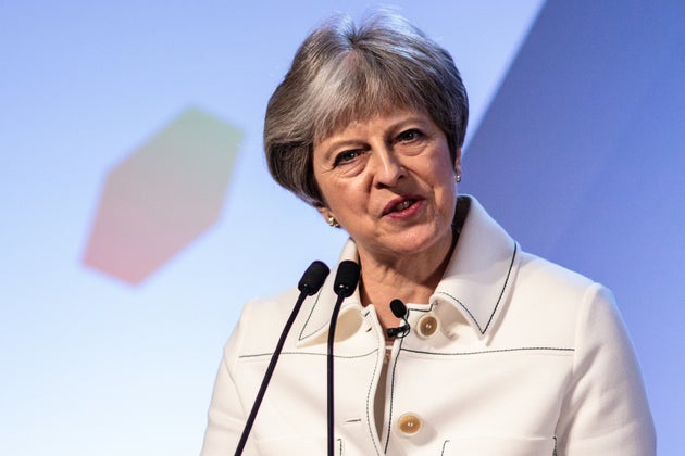 British Prime Minister Theresa May speaks at the Business Forum Opening Session on the first day of the Commonwealth Heads of Government Meeting 2018 in London