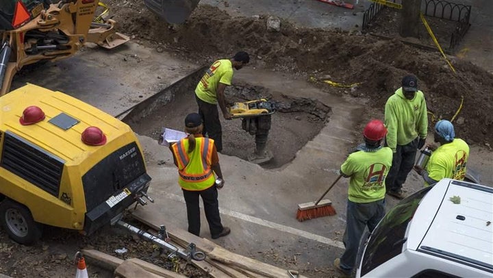 Contractors repair an underground sewer pipe in Brooklyn, New York. A new study aims to track sound across the city.