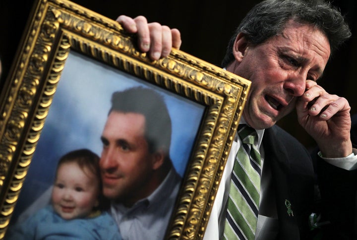 Neil Heslin testifies during a Senate hearing on assault weapons in February 2013.