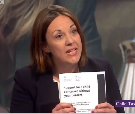 Kezia Dugdale held the form up to Employment Minister Alok Sharma 