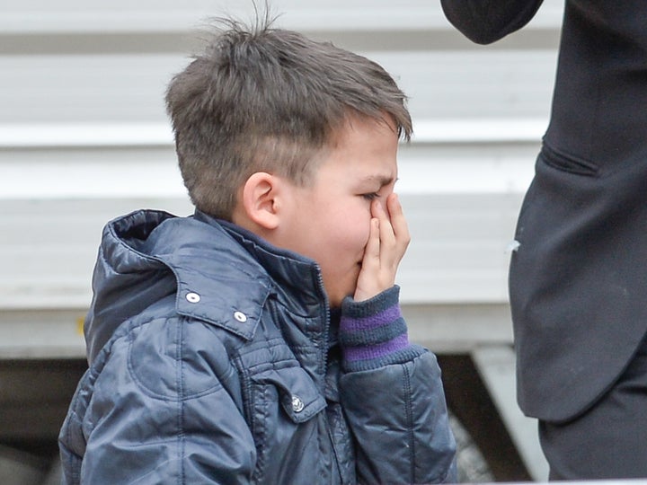 Emanuele cries during an encounter with Pope Francis on April 15.