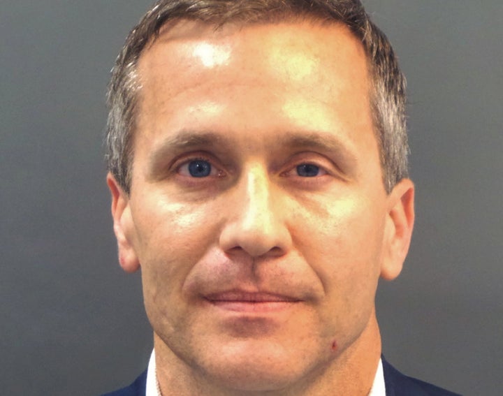 Greitens appears in a Feb. 22 police booking photo after he was charged with felony invasion of privacy. Tuesday's announcement has to do with a separate possible felony charge over political fundraising activity.