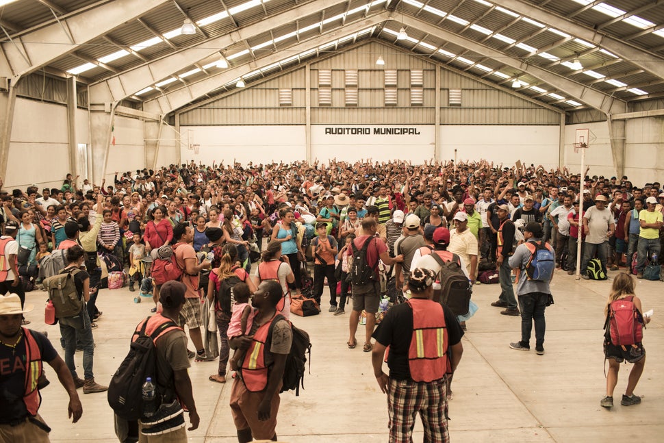 A group of Central American refugees and asylum-seekers, led by the collective Pueblo Sin Fronteras, waits for buses in Ixtep