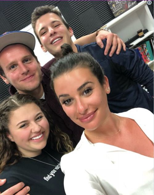 Jonathan Groff and Lea Michele pose with Stoneman Douglas school shooting survivors Sawyer Garrity, bottom left, and Cameron Kasky, top right.