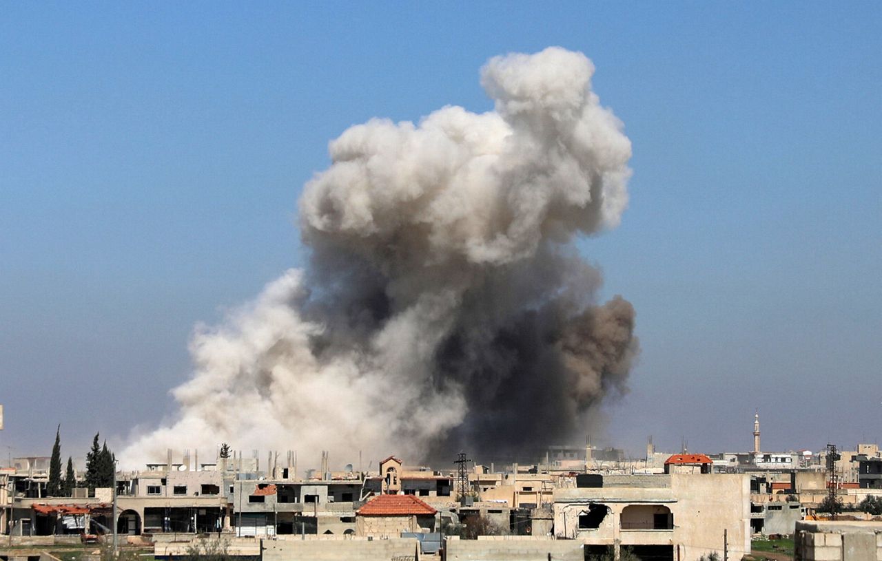 Smoke rises in Busra al-Harir town, near Deraa, Syria in March.