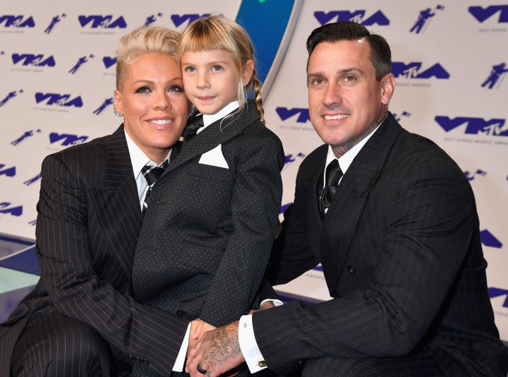 Pink at the MTV Video Music Awards in 2017 with her husband, Carey Hart, and their daughter Willow.