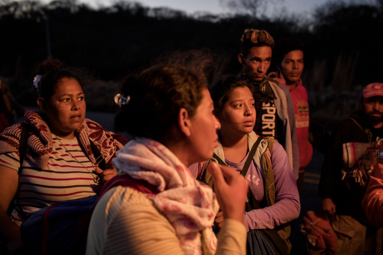 A group of women talk with the medical attention unit of the "refugee caravan" heading from southern Mexico to the U.S.