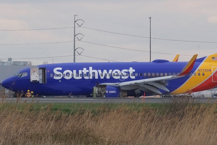 The damaged Southwest Airlines plane after landing at Philadelphia International Airport.