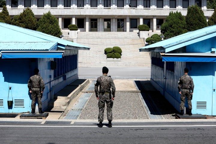 South Korean soldiers stand guard at the Demilitarized Zone on April 11. The Korean War has never been formally ended, a