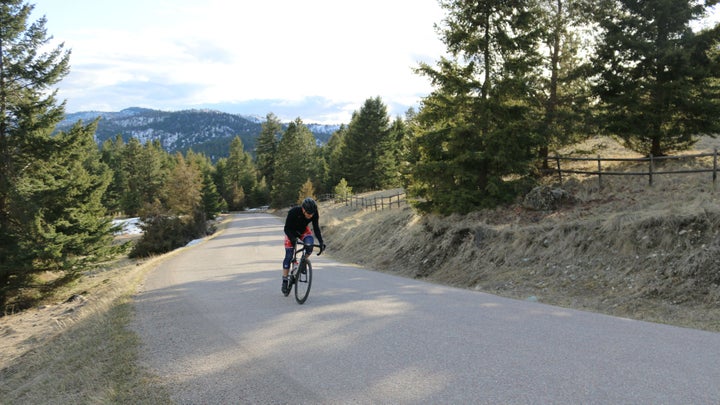 Dan McAllister climbs a hill in Lone Pine State Park in Montana. McAllister is one of many who have moved to Flathead County,