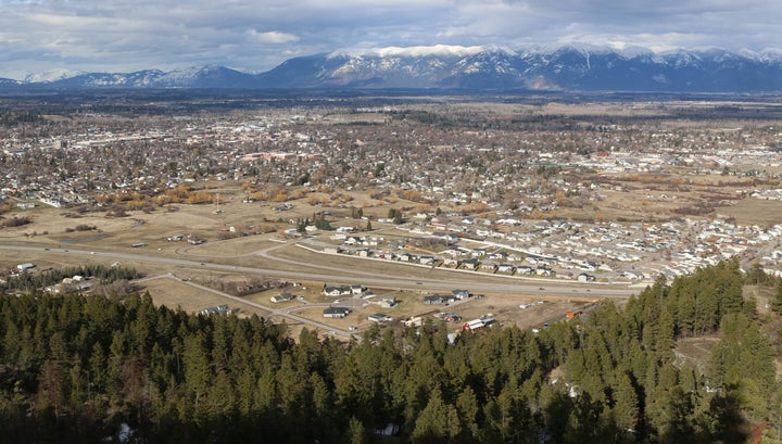 A view of the city of Kalispell, Montana, from the top of Lone Pine State Park. In the distance are the vistas of Glacier National Park.