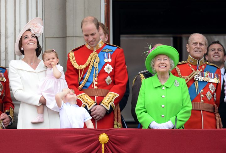 The Queen, Prince Philip and the Duke and Duchess of Cambridge stand on the balcony at Buckingham Palace following the Trooping of the Colour for her 90th birthday in 2016