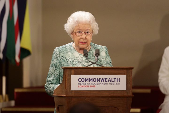 Queen Elizabeth II gives a speech at the formal opening of the Commonwealth Heads of Government Meeting at Buckingham Palace on April 19 in London. 