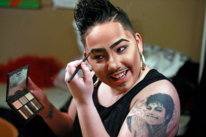 Janelle Felix makes up before performing as drag king Tenderoni on March 24, 2018, at the Berlin Nightclub's "Drag Matinee" in Chicago.
