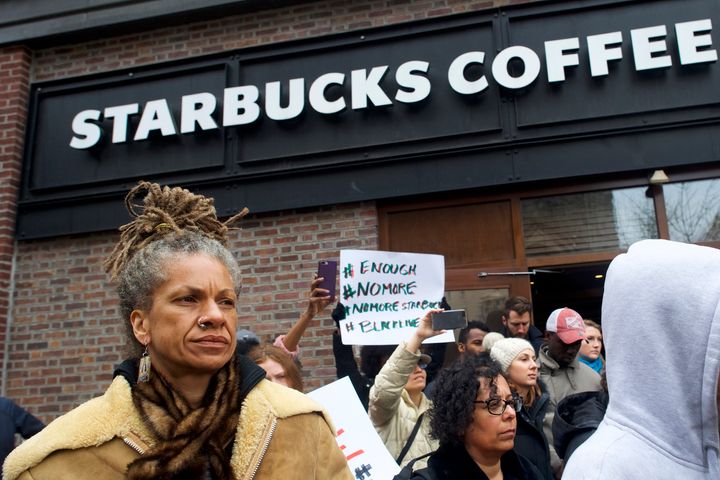 Protester Michelle Brown outside a Center City Starbucks on Sunday in Philadelphia.