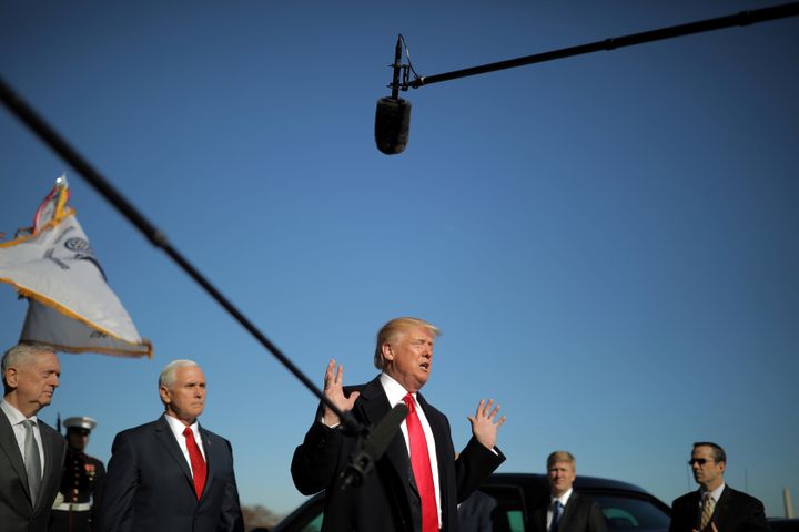 President Donald Trump speaks to reporters at the Pentagon accompanied by Defense Secretary Jim Mattis and Vice President Mike Pence in January.
