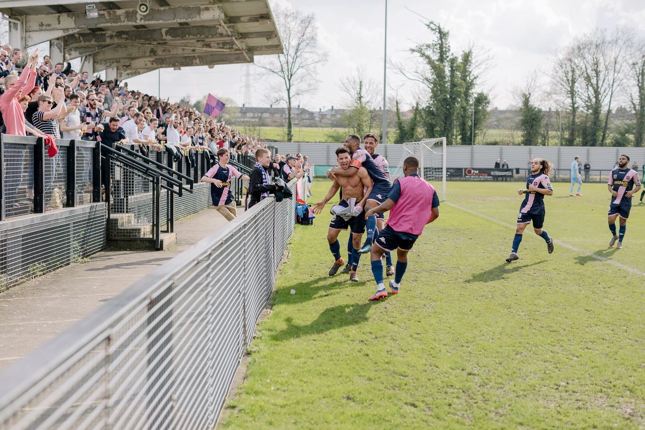 Dulwich Hamlet players celebrate a goal.