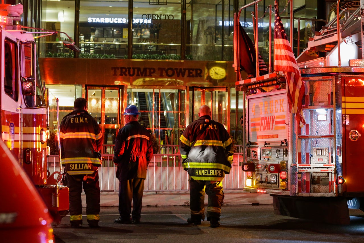 Firefighters at Trump Tower on April 7 in Manhattan. Six firefighters were injured battling the blaze that broke out on the 50th floor.