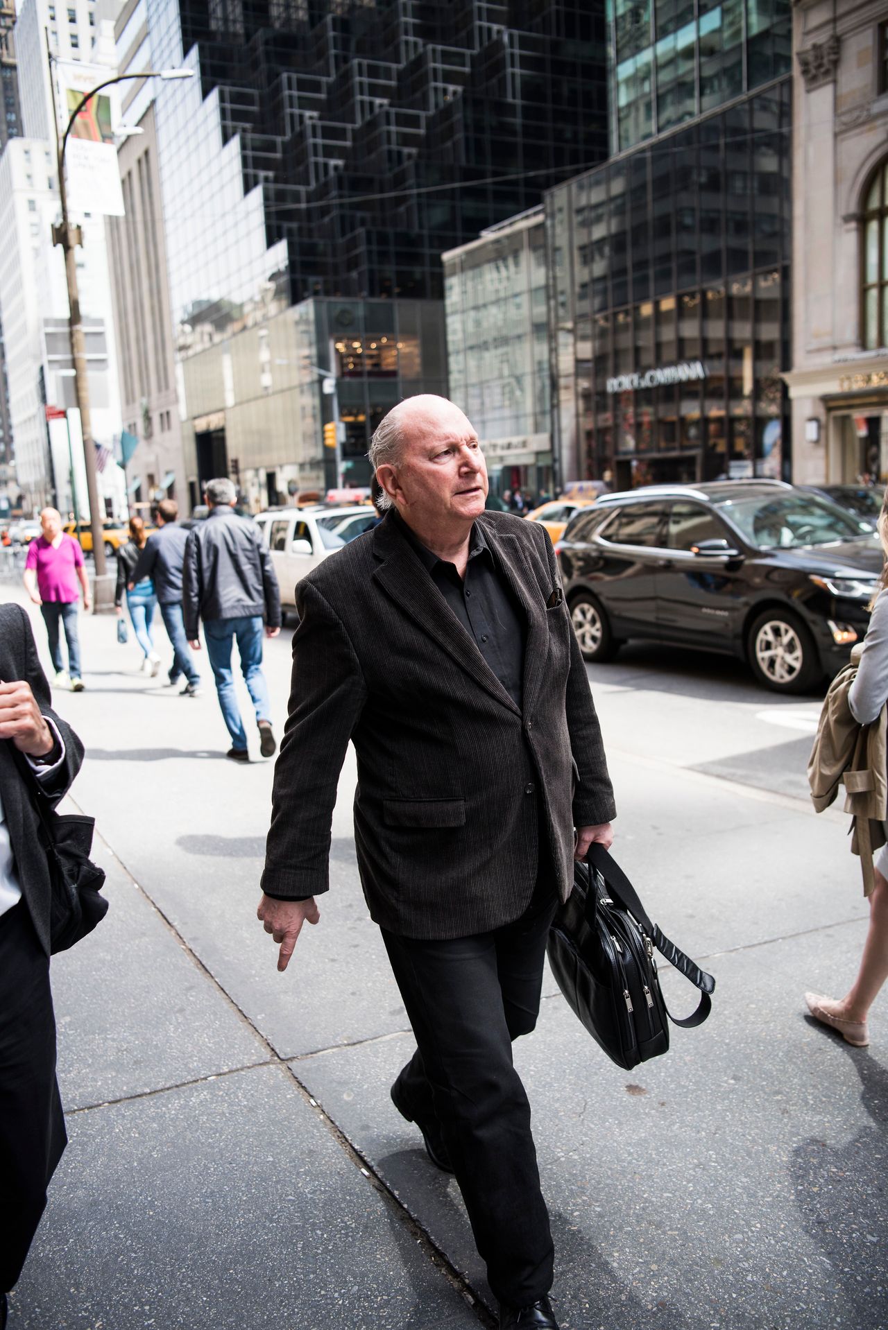 Jerome Rose walks along Fifth Avenue in Manhattan. He has moved to a ground-floor apartment after a fire in his previous building killed four people in 1998.